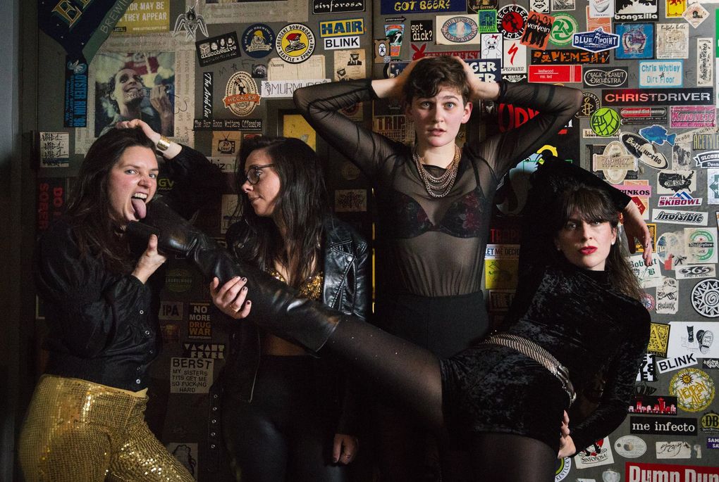 Seattle band Thunderpussy, from left: Whitney Petty, Leah Julius, Ruby Dunphy and Molly Sides, in 2017 after playing a show at Elysian Brewing on Capitol Hill. (Lindsey Wasson / The Seattle Times)