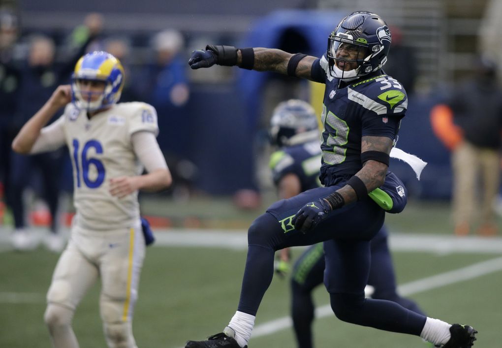 Seattle Seahawks strong safety Jamal Adams (33) reacts to a play with Los Angeles Rams quarterback Jared Goff (16) in the background, during the second half of an NFL football game, Sunday, Dec. 27, 2020, in Seattle. (AP Photo/Scott Eklund) SE154 SE154 (Scott Eklund / The Associated Press)