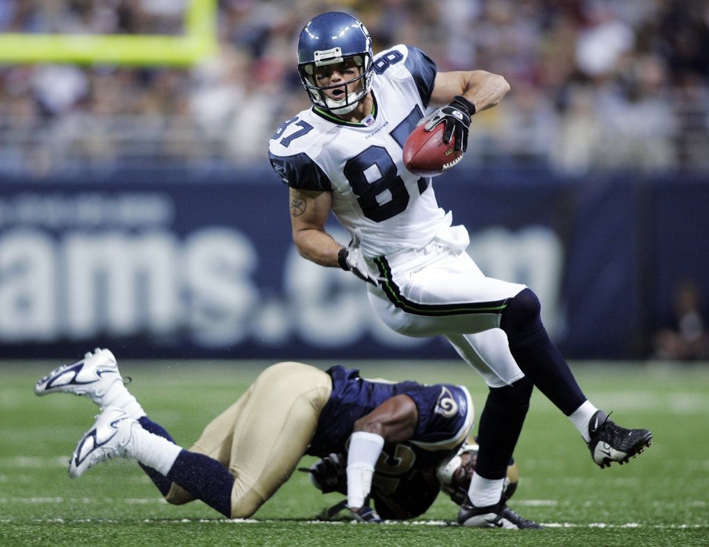 Seattle receiver Joe Jurevicius breaks a tackle by St. Louis’ Chris Johnson during the Seahawks 37-31 defeat of the Rams at the Edward Jones Dome. Jurevicius caught nine passes for 139 yards and a touchdown starting in place of the injured Darrell Jackson. (Rod Mar / The Seattle Times)