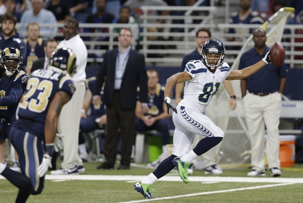 Seattle Seahawks wide receiver Golden Tate (81) runs to the end zone for a touchdown during the second half of an NFL football game against the St. Louis Rams, Monday, Oct. 28, 2013, in St. Louis. (Michael Conroy / The Associated Press)