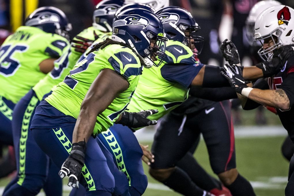 SEAHAWKS FILE —
Seahawks offensive tackle Brandon Shell and the offensive line hold the pocket as the Seattle Seahawks take on the Arizona Cardinals for Thursday Night Football at Lumen Field in Seattle Thursday November 19, 2020. 215694 (Bettina Hansen / The Seattle Times)