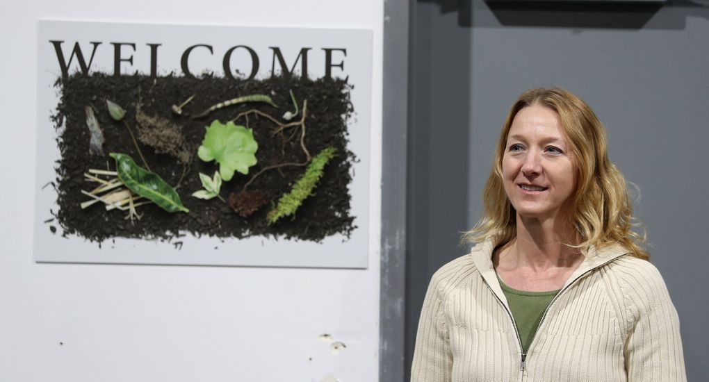 Lynne Carpenter-Boggs, who removed her mask for a moment for a portrait, is lead soil research adviser at Recompose, the natural organic reduction funeral home in Kent. Carpenter-Boggs is a professor of sustainable and organic agriculture at Washington State University. (Ken Lambert / The Seattle Times)