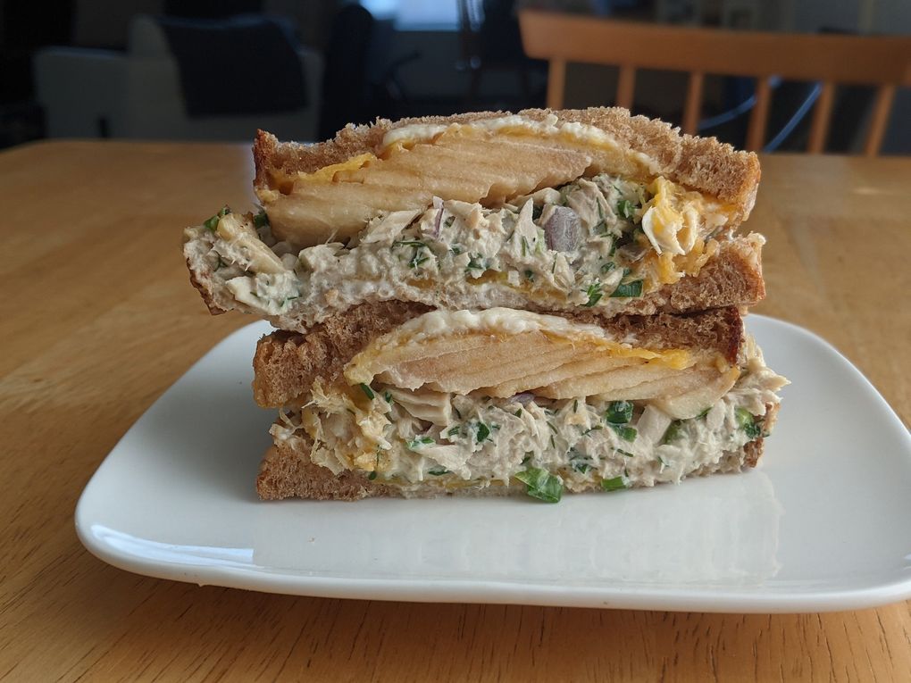 Taproot Cafe’s tuna melt is piled with cheddar and an ample amount of apple slices. (Jackie Varriano / The Seattle Times)