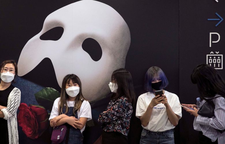 FILE – People wait in line to see ÒPhantom of the Opera,Ó in Seoul, South Korea, May 28, 2020. Governments around the world have tried to support the arts during the pandemic, some more generously than others. (Woohae Cho/The New York Times)