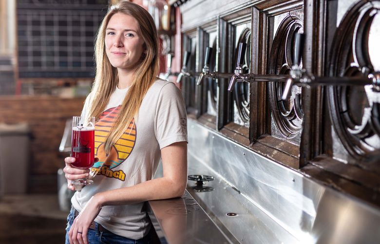 Rachel Edwards, the head brewer of Oozlefinch Beers & Blending in Fort Monroe, Va., Dec. 8, 2020. Edwards regularly makes beers simulating sweets such as strawberry pie, coffee cake and even banana pancakes topped with syrup. (Parker Michels-Boyce/The New York Times)