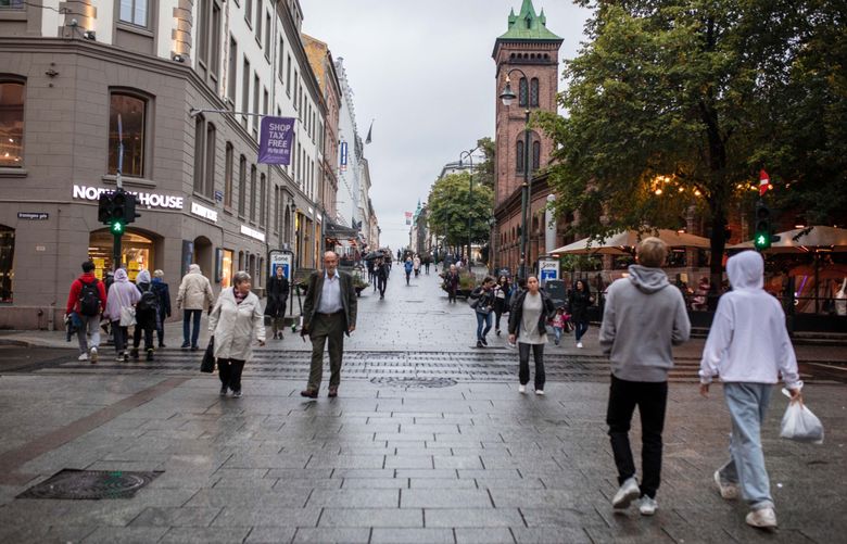 Pedestrians walk along Karl Johans Gate, the main shopping street in Oslo, Norway, on Sept. 23, 2020. MUST CREDIT: Bloomberg photo by Odin Jaeger.