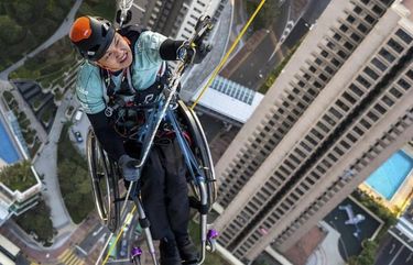 In a photo from Ignite Community Services, Lai Chi-wai climbs a skyscraper in Hong Kong, Jan. 16, 2021. Lai fell short of his goal of ascending a skyscraper by rope. It hardly made his feat any less impressive. (Ignite Community Services via The New York Times) — NO SALES; FOR EDITORIAL USE ONLY WITH NYT STORY HONG KONG CLIMBER BY TIFFANY MAY FOR JAN. 18, 2021. ALL OTHER USE PROHIBITED. —