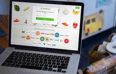 The Instacart website on a laptop computer arranged in Hastings-on-Hudson, New York, U.S., on Monday, Jan. 4, 2021. A booming market for U.S. initial public offerings shows no sign of slowing in 2021. Grocery-delivery company Instacart Inc. is preparing for a listing, according to people familiar with the matter. Photographer: Tiffany Hagler-Geard/Bloomberg