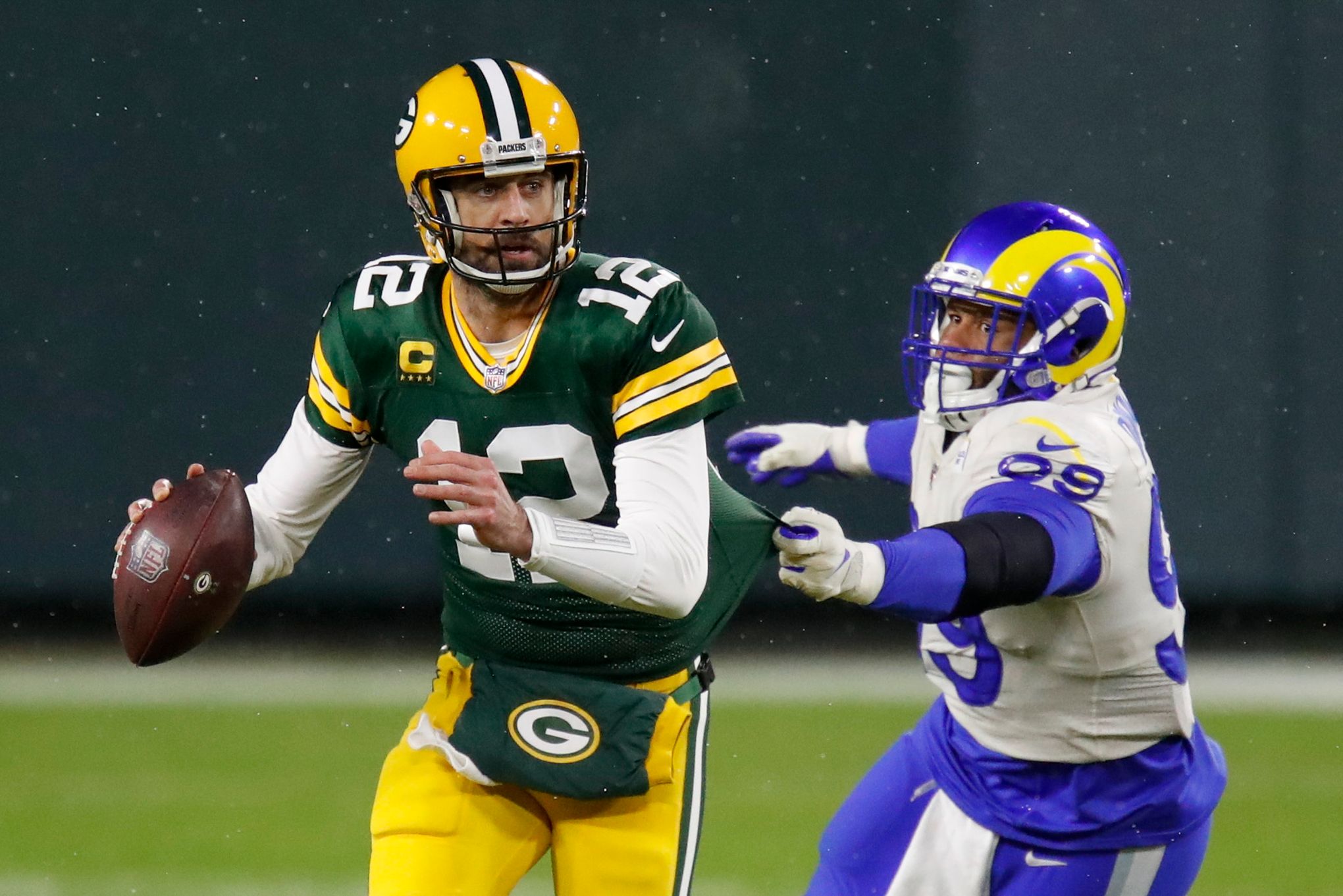 Packers' pressure stifles Rams