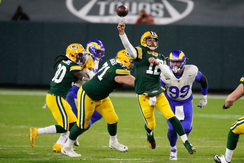 Packers' pressure stifles Rams