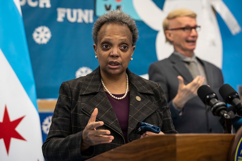 Mayor Lori Lightfoot speaks to reporters after visiting preschool classrooms at Dawes Elementary School in Chicago, Monday, Jan. 11, 2021. Monday was the first day of optional in-person learning for preschoolers and some special education students in Chicago Public Schools after going remote last March due to the coronavirus pandemic. (Ashlee Rezin Garcia/Chicago Sun-Times via AP, Pool)
