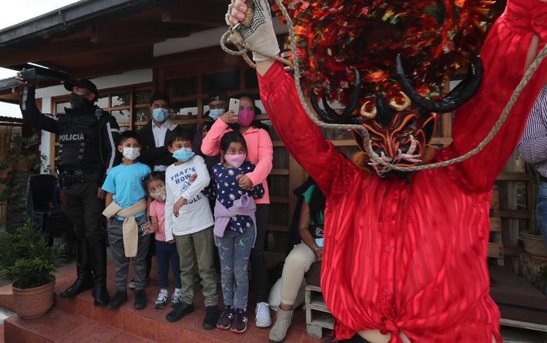 Devils dance, observe virus protocols at Ecuador festival | The Seattle  Times