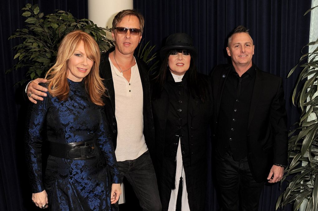 From left: Nancy Wilson of Heart, Jerry Cantrell of Alice in Chains, Ann Wilson of Heart and Mike McCready of Pearl Jam attend the Rock & Roll Hall of Fame induction ceremony in Los Angeles in 2013, when Heart was inducted. “They’ve always been there for us, man,” Cantrell says of Ann and Nancy Wilson. “All of us. All of the next generation of bands that came up.” (Jordan Strauss / Invision / The Associated Press)