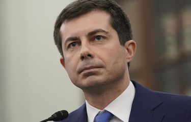 FILE – In this Jan. 21, 2021, file photo, Transportation Secretary nominee Pete Buttigieg speaks during a Senate Commerce, Science and Transportation Committee confirmation hearing on Capitol Hill in Washington. (Stefani Reynolds/Pool via AP) WX202 WX202