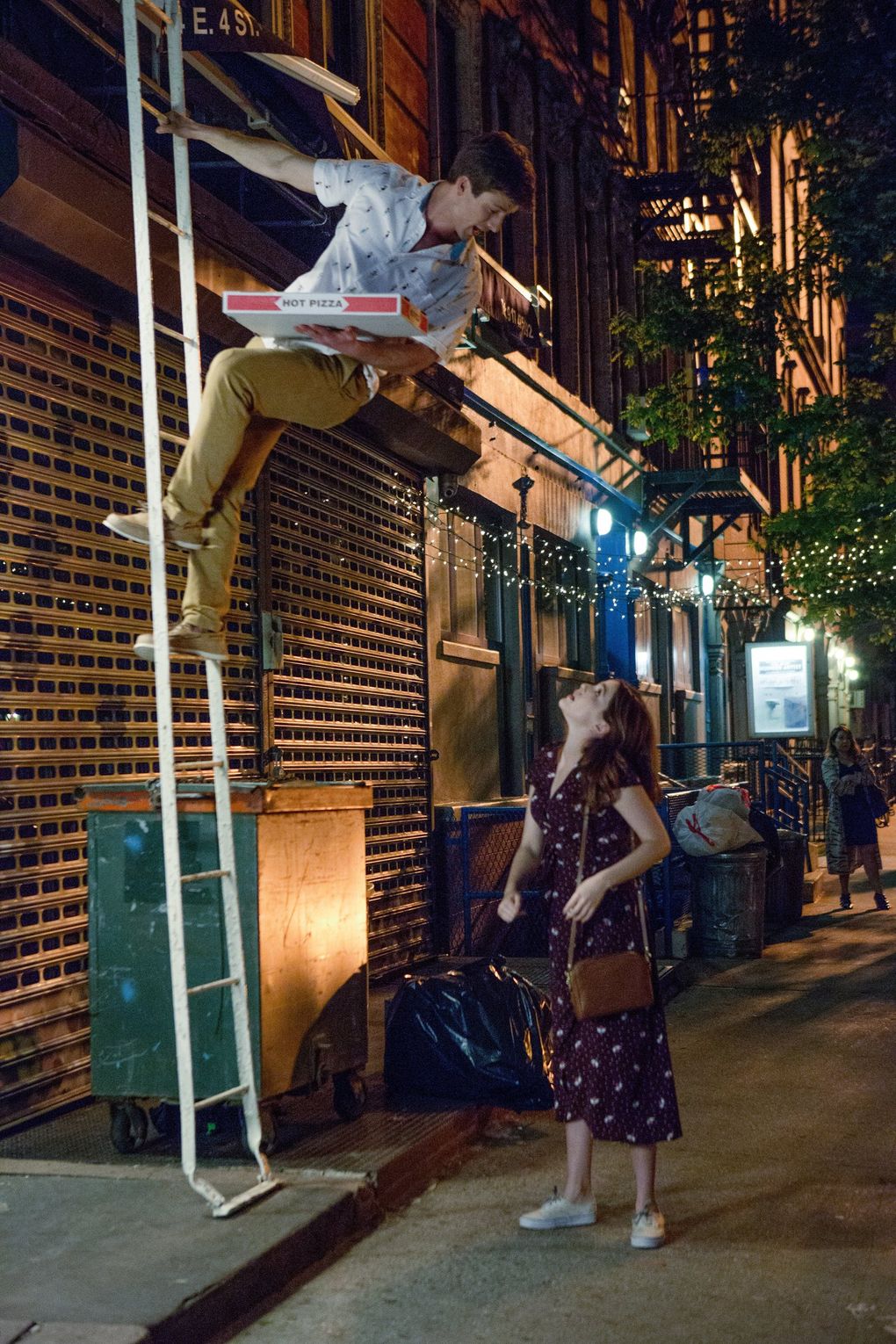 Spoiler alert: A pizza plays a key role in “Set it Up,” a 2018 Netflix rom-com starring Zoey Deutch as Harper and Glen Powell as Charlie. (KC Baily / Netflix)