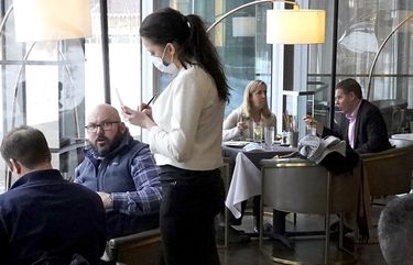 Patrons enjoy lunch at Gibsons Italia restaurant in Chicago last month. The latest jobs numbers show weakness in employment is not limited to the hardest-hit sectors such as restaurants and tourism. (Charles Rex Arbogast / The Associated Press) 