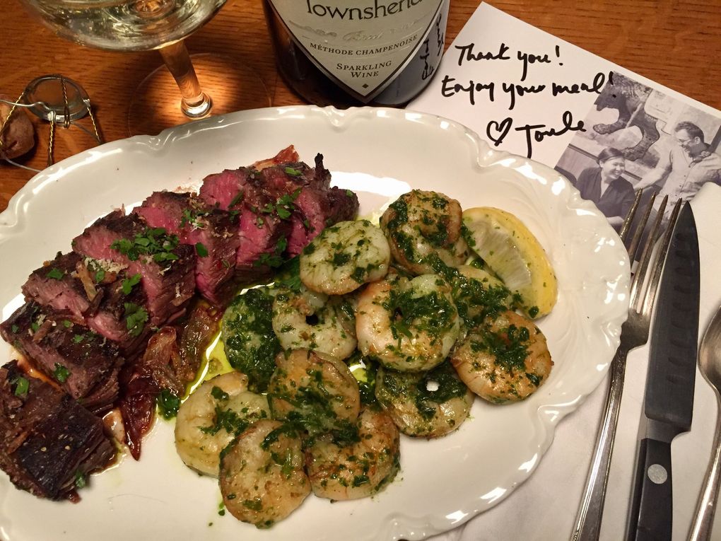 From Seattle’s Joule, the wagyu bavette steak and the cilantro chimichurri shrimp come with a lovely little thank-you note. (Bethany Jean Clement / The Seattle Times)