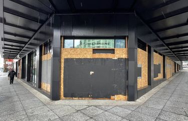 Wed. Feb. 3, 2021  Boarded up and closed store in downtown Seattle.   216294