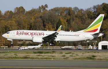 In this photo dated November 12, 2018, the actual Ethiopian Airlines Boeing 737 – Max 8 plane, that crashed Sunday March 10, 2019, shortly after take-off from Addis Ababa, Ethiopia, shown as it lands at Seattle Boeing Field King County International airport, USA.  U.S. aviation experts on Tuesday March 12, 2019, joined the investigation into the crash of this Ethiopian Airlines jetliner that killed 157 people, as questions grow about the new Boeing plane involved in the crash. (AP Photo/Preston Fiedler)