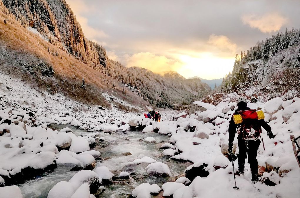 Rescue teams make their way out of the Nisqually River drainage basin after finding Michael Knapinski. (Tacoma Mountain Rescue)