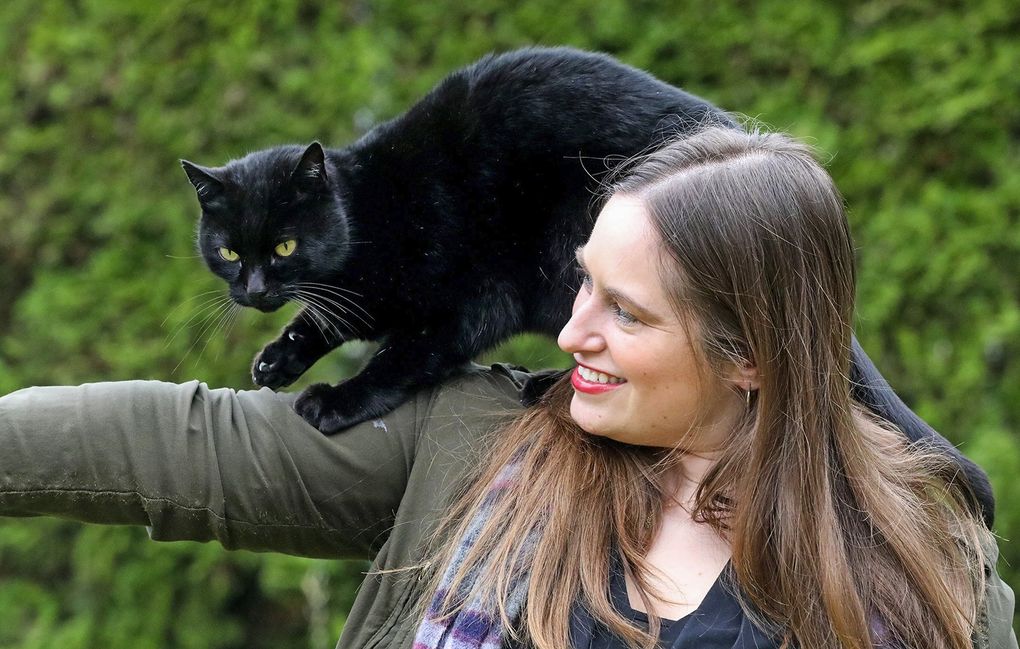 Angela Rozmyn has helped many people find vaccination appointments, even though she won’t be getting hers for a few months, because of her age. (Greg Gilbert / The Seattle Times)