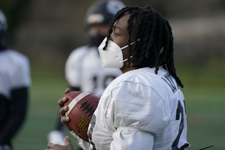 NFL considers helmet facemasks with surgical, N95 material 