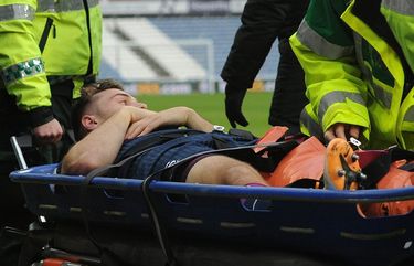 HUDDERSFIELD, ENGLAND – FEBRUARY 20: Jordan Morris of Swansea City is taken of the field on a stretcher during the Sky Bet Championship match between Huddersfield Town and Swansea City at The John Smith’s Stadium on February 20, 2021 in Huddersfield, England. (Photo by Athena Pictures/Getty Images)