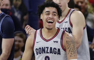 Gonzaga guard Julian Strawther celebrates his basket during the second half of an NCAA college basketball game against San Diego in Spokane, Wash., Saturday, Feb. 20, 2021. (AP Photo/Young Kwak) WAYK117 WAYK117