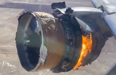 In this image taken from video, the engine of United Airlines Flight 328 is on fire after after experiencing “a right-engine failure” shortly after takeoff from Denver International Airport, Saturday, Feb. 20, 2021, in Denver, Colo. The Boeing 777 landed safely and none of the passengers or crew onboard were hurt. (Chad Schnell via AP) NYDD201