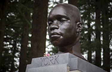 A bust of York, a member of the Lewis and Clark expedition, is seen on Mount Tabor in southeast Portland, Ore., on Sunday Feb. 21, 2021. The statue appeared the day before. (Mark Graves/The Oregonian via AP) ORPOR303 ORPOR303