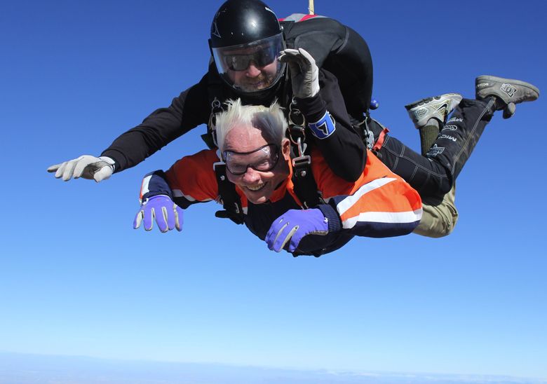 Former UW athletic director Mike Lude parachuted from an airplane at 93 and wants to do it again at 100.  ( / courtesy of Mike Lude)
