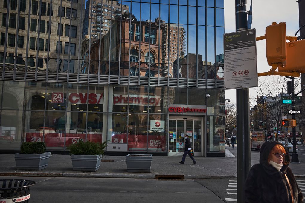 A CVS store in Manhattan, in January. CVS and other pharmacies are dangling five-figure signing bonuses and competing against each other to quickly recruit pharmacists and support staff to be ready when they receive doses of COVID-19 vaccines. (John Taggart/The New York Times)