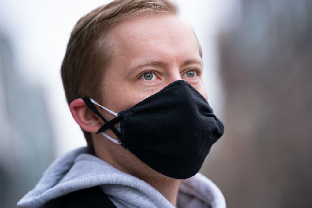 Daniel Ryan, 27, wears two masks, following one of the CDC’s recommendations to protect against more transmissible coronavirus variants. (Washington Post photo by Sarah L. Voisin).