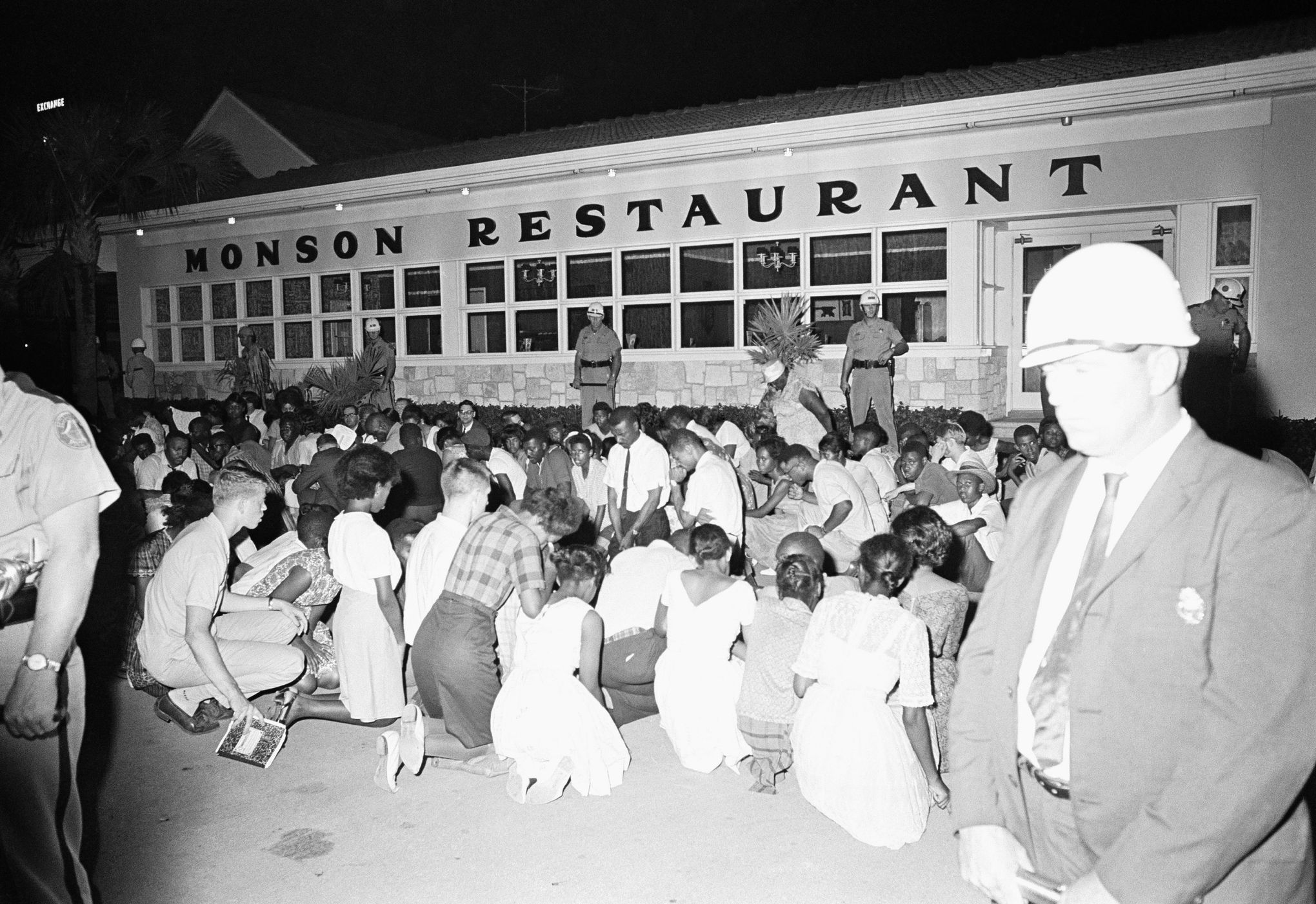 Dr. Martin Luther King, Jr., with Jackie Robinson on his right