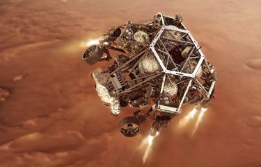 In this illustration provided by NASA, the Perseverance rover fires up its descent stage engines as it nears the Martian surface.. This phase of its entry, descent and landing sequence, or EDL, is known as “powered descent.” (NASA/JPL-Caltech via AP) NY690 NY690
