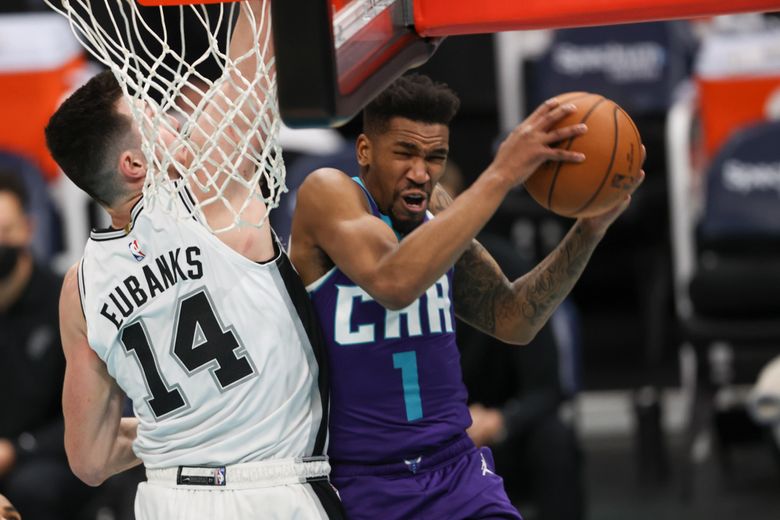 Charlotte Hornets' LaMelo Ball, San Antonio Spurs' Dejounte Murray