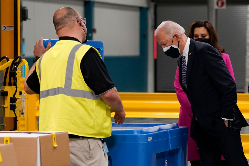 FILE – In this Feb. 19, 2021, file photo President Joe Biden and Michigan Gov. Gretchen Whitmer, tour a Pfizer manufacturing site, Friday, Feb. 19, 2021, in Portage, Mich. (AP Photo/Evan Vucci, File)