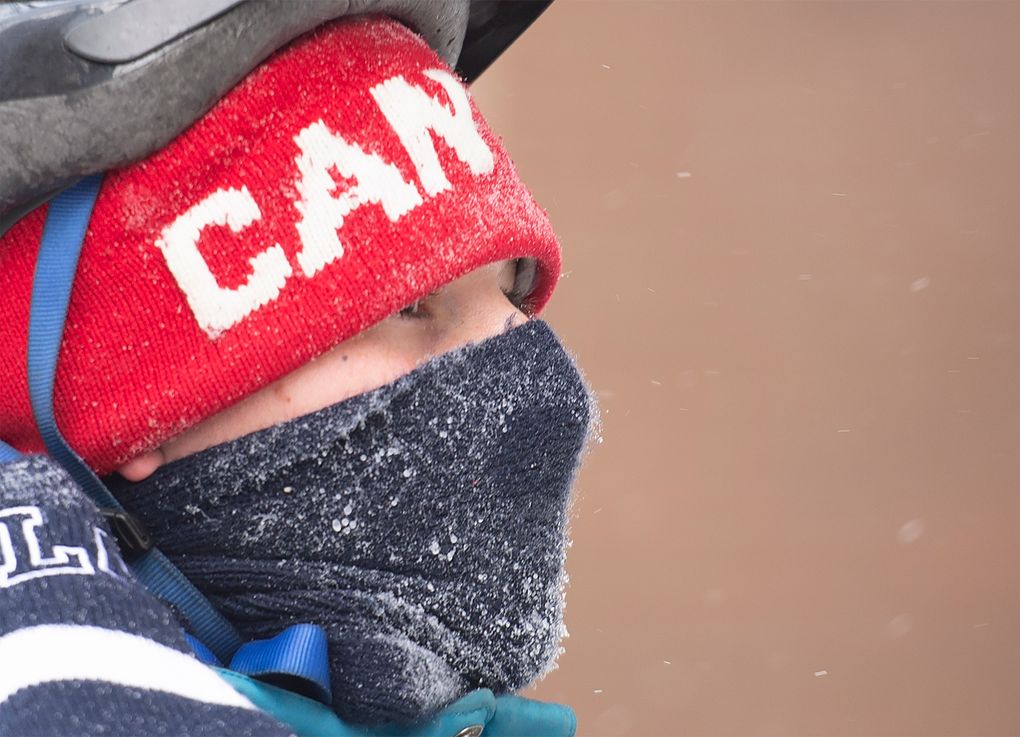 A man wears a face covering on a cold winter day in Montreal, Saturday, January 30, 2021, as the COVID-19 pandemic continues in Canada and around the world. (Graham Hughes/The Canadian Press via AP)