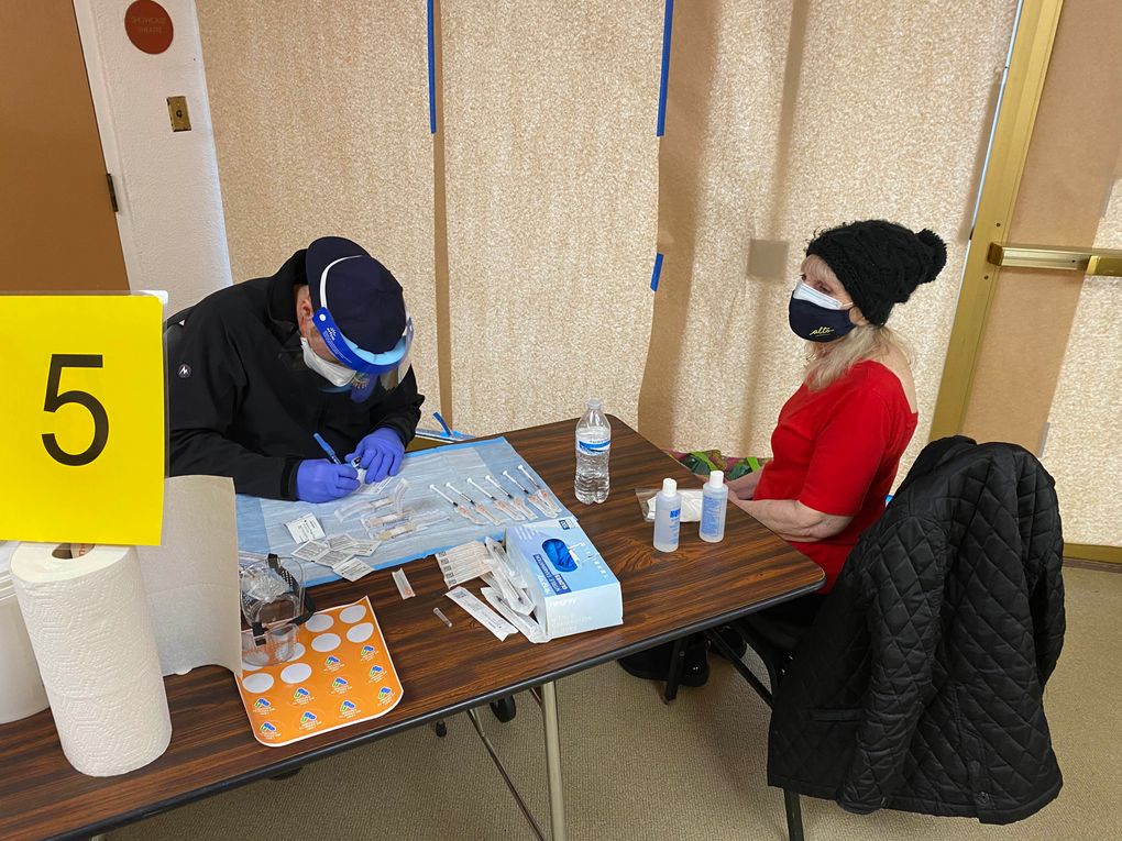 Yami Anolik, 75, receives the first dose of a coronavirus vaccine after her daughter Sharon Shakked helped secure an appointment. (Photo by Sharon Shakked via The Washington Post).