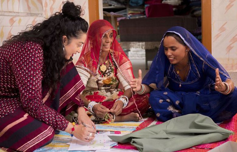 Designer Akanksha Deo from Indian social entrepreneur Rangsutra works with artisans to develop a cushion cover for Ikea. (Inter Ikea Group via Bloomberg)
