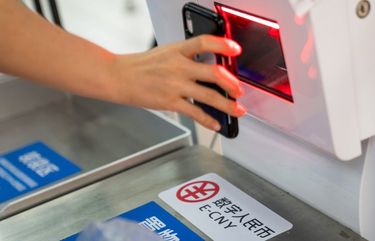 Signage for the digital yuan, also referred to as E-CNY, at a self check-out counter inside a supermarket in Shenzhen, China, on Friday, Nov. 20, 2020. The People’s Bank of China is testing its digital money — dubbed Digital Currency Electronic Payment, or DCEP — in select cities, catapulting the world’s No. 2 economy to the forefront of a race to develop virtual money. 775594687