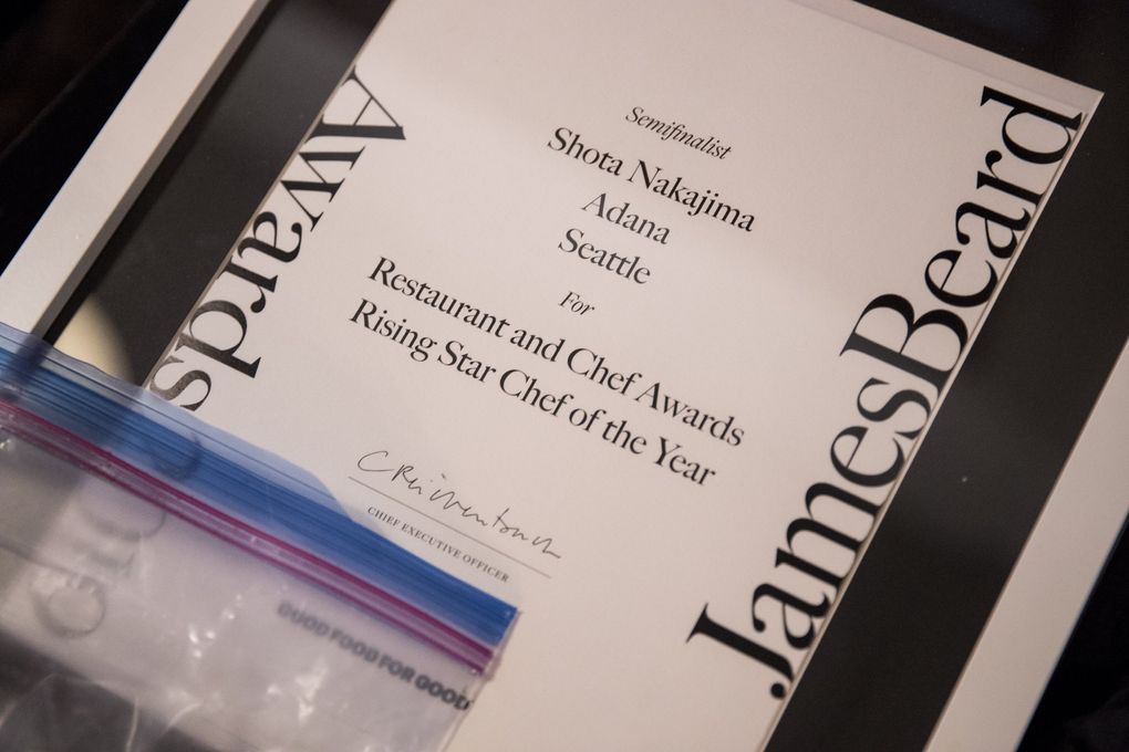 One of chef Shota Nakajima’s James Beard certificates awaits on a table as the Adana space is cleared out on Thursday, May 21, 2020. (Amanda Snyder / The Seattle Times)