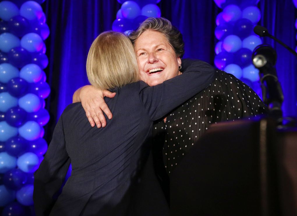 Washington State Democratic Chair Tina Podlodowski gets a hug from Sen. Patty Murray at an election night party in 2018. Podlodowski said of the state’s Republicans, “I do believe we’re in a place where we just don’t have a values match.” (Ken Lambert / The Seattle Times, file)