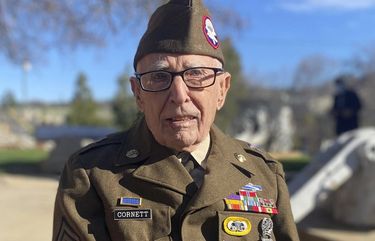 In this Feb. 22, 2021 photo, Sgt. 1st Class Marvin D. Cornett poses for a photo, in in Auburn, Calif. Cornett was awarded the Purple Heart and Bronze Star Medal during a ceremony. Cornett was assigned to Headquarters Company, 1st Battalion, 504th Parachute Infantry Regiment, 82nd Abn. Div. when he made the combat jump into Salerno, Italy and was later wounded during combat operations along the Mussolini Canal at the Anzio beachhead on Dec. 31, 1944. (U.S. Army via AP) AX101 AX101