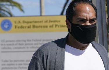 Kareen Troitino stands outside the Federal Corrections Institution, Friday, March 12, 2021, in Miami. Troitino, a local correction’s officer union president, said that fewer than half of the facility’s 240 employees have been fully vaccinated as of March 11. Many of the workers who refused had expressed concerns about the vaccine’s efficacy and side effects, Troitino said. (AP Photo/Marta Lavandier) FLML106 FLML106