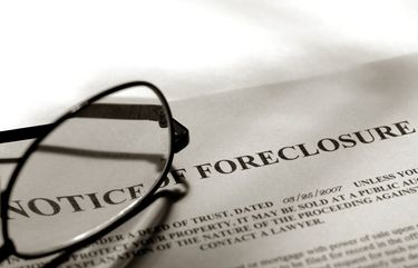 The federal government’s foreclosure moratorium and CARES Act mortgage forbearance program have kept foreclosures relatively low. (Dreamstime/TNS) 11222428W 11222428W