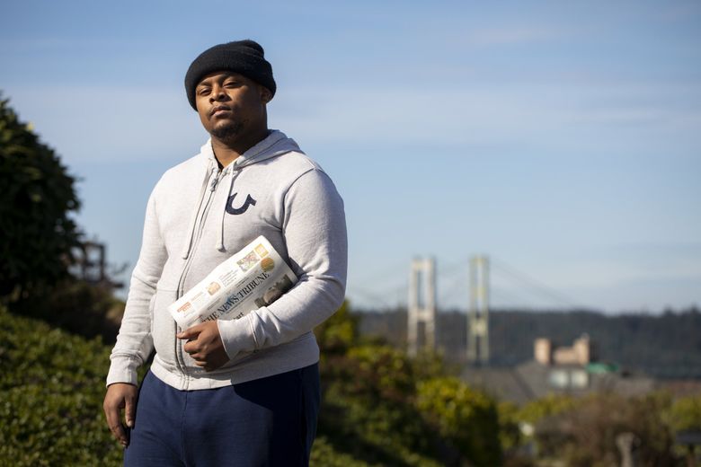 Sedrick Altheimer, 24, was delivering newspapers in the West End of Tacoma early one morning in late January, when a white unmarked SUV started following him. Later, he found out that the driver of the car was Pierce County Sheriff Ed Troyer. “Nobody’s ever messed with me like he did,” said Altheimer, who has delivered newspapers in the area for several years. “He kept following me. Antagonizing me.”
 (Bettina Hansen / The Seattle Times)