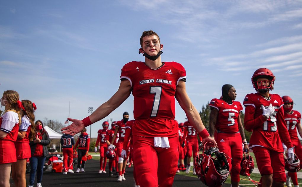 Sam Huard comes off the field at halftime having just secured the state’s all-time passing record.
Sam Huard became the stateís all-time passing leader with Kennedyís 60-17 win over Kentwood Saturday, March 27, 2021. 216674 (Dean Rutz / The Seattle Times)