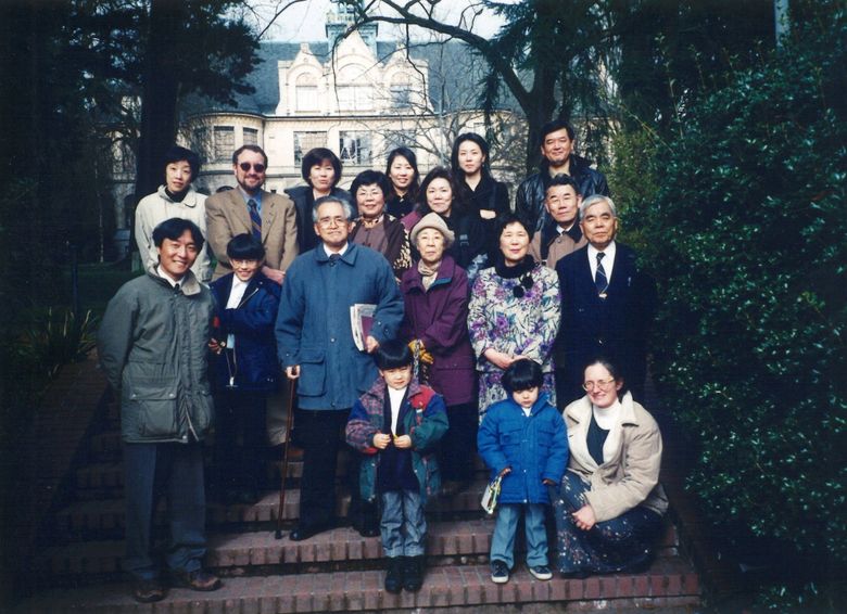 Writer Steven Goldsmith (back row, second from left) takes descendants of Takuji Yamashita on a tour of their ancestor’s alma mater, the University of Washington, after a 2001 ceremony honoring Yamashita for his early battles for Asian American rights. The visitors included grandchildren, great-grandchildren and great-great-grandchildren of Yamashita, as well as spouses. (Courtesy Steven Goldsmith, 2001)