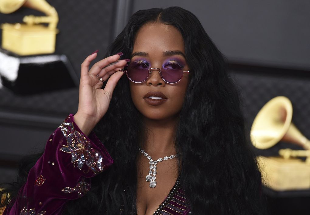 H.E.R. arrives at the 63rd annual Grammy Awards at the Los Angeles Convention Center on Sunday. (Jordan Strauss / Invision / The Associated Press)